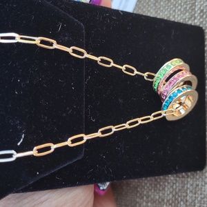 Park Lane gold plated necklace with 3 rhinestone rings.